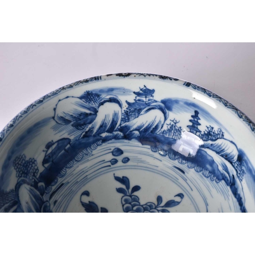 207 - A Chinese blue & white bowl, Shunzhi, mid 17th century, the interior painted with a foliate sprig bo... 