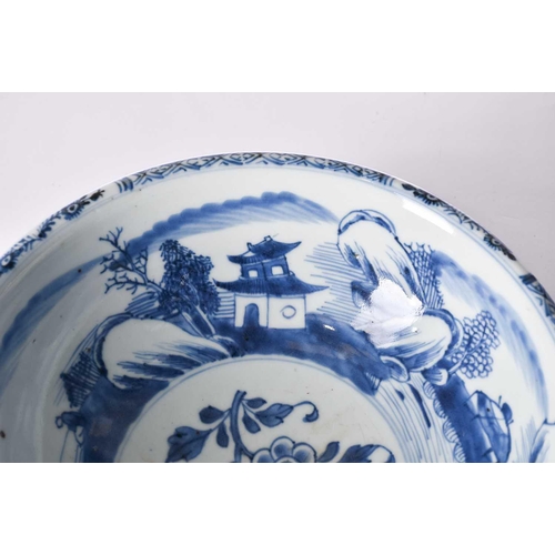 207 - A Chinese blue & white bowl, Shunzhi, mid 17th century, the interior painted with a foliate sprig bo... 