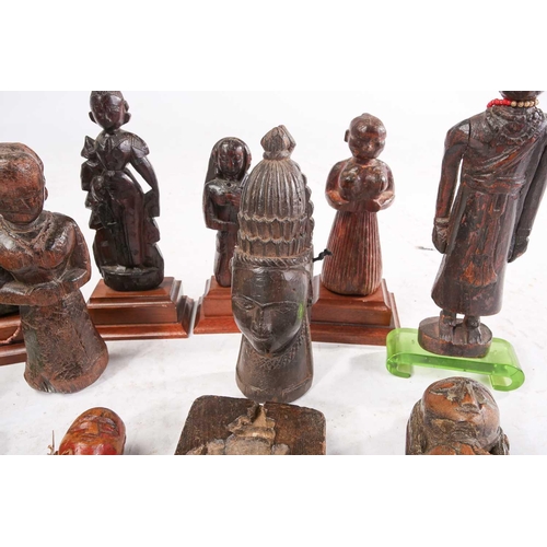 209 - A collection of Indian carved wood figures, 18/19th century and later, mostly depicting standing fem... 