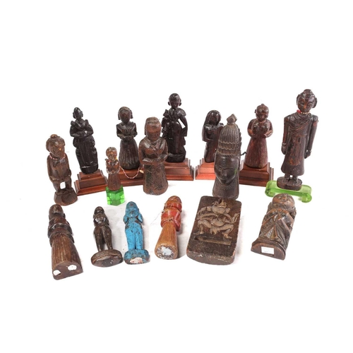 209 - A collection of Indian carved wood figures, 18/19th century and later, mostly depicting standing fem... 