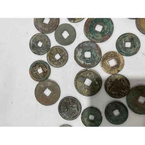 220 - A collection of fifty Chinese Tang - Song dynasty coins, 22mm - 41mm