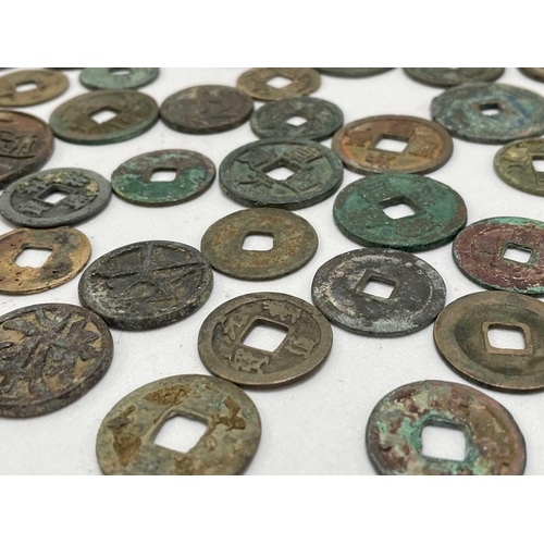 220 - A collection of fifty Chinese Tang - Song dynasty coins, 22mm - 41mm