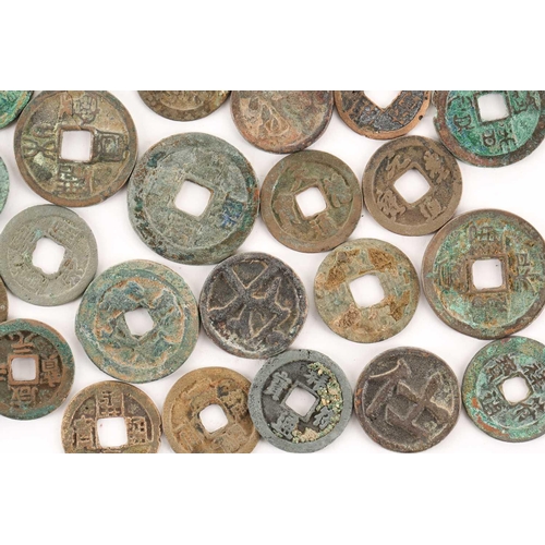 220 - A collection of fifty Chinese Tang - Song dynasty coins, 22mm - 41mm