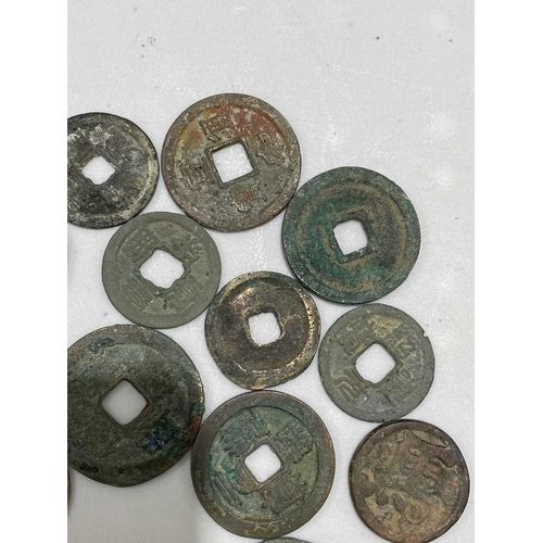 220 - A collection of fifty Chinese Tang - Song dynasty coins, 22mm - 41mm