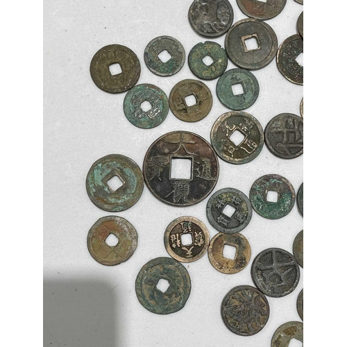 220 - A collection of fifty Chinese Tang - Song dynasty coins, 22mm - 41mm