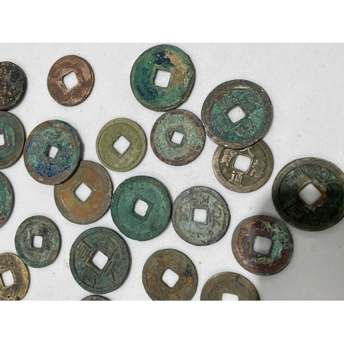 220 - A collection of fifty Chinese Tang - Song dynasty coins, 22mm - 41mm