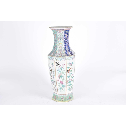 223 - A Chinese porcelain octagonal vase, Qing, 19th century, painted in the famille rose palette, the wai... 