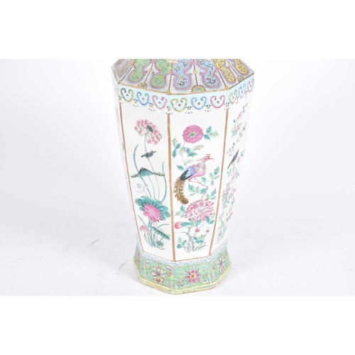 223 - A Chinese porcelain octagonal vase, Qing, 19th century, painted in the famille rose palette, the wai... 