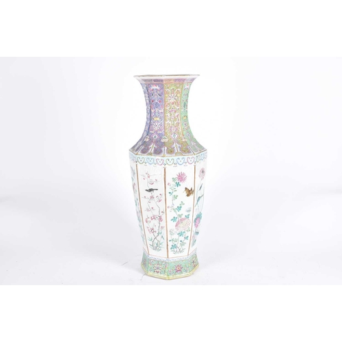 223 - A Chinese porcelain octagonal vase, Qing, 19th century, painted in the famille rose palette, the wai... 