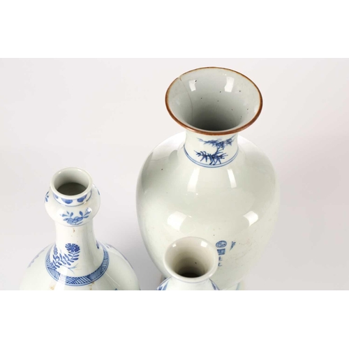 225 - Three Chinese blue & white vases, one with garlic mouth and decorated with antiques, 20.5cm; a doubl... 