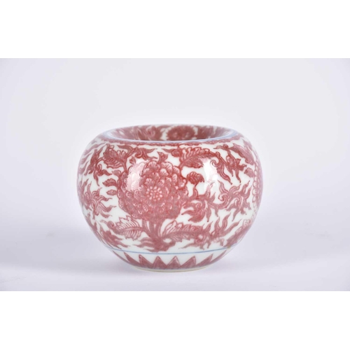 227 - A Chinese iron red brush washer, of bulbous form with inverted rim, painted with peonies and chrysan... 