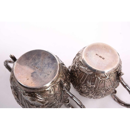 228 - A Chinese three piece silver teaset by Wang Hing, late Qing, each piece of barrel form, the teapot r... 