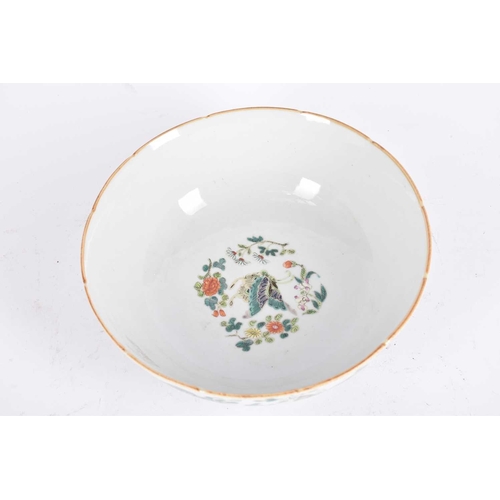 237 - A Chinese famille rose butterfly bowl, the interior with a single butterfly in a border of flowers, ... 