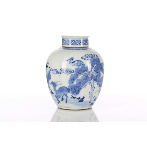 239 - A Chinese blue & white tea caddy, Qing, 18th/19th century, the lid painted with a single crane over ... 