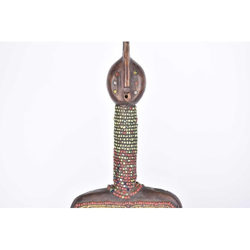 250 - A Mahongwe reliquary figure, Gabon, copper and brass strips on wood, 42.5cm, a large Namji (Dowayo) ... 