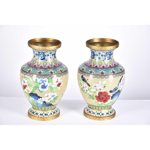 256 - A pair of Chinese cloisonne vases, second half of the 20th, decorated with floral bands above birds ... 