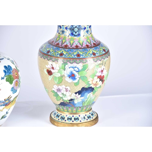 256 - A pair of Chinese cloisonne vases, second half of the 20th, decorated with floral bands above birds ... 