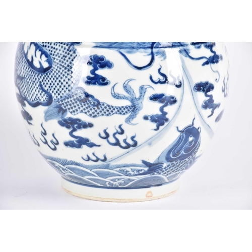 261 - A large Chinese blue & white tianqiuping dragon vase, the flared neck painted with spuming waves abo... 