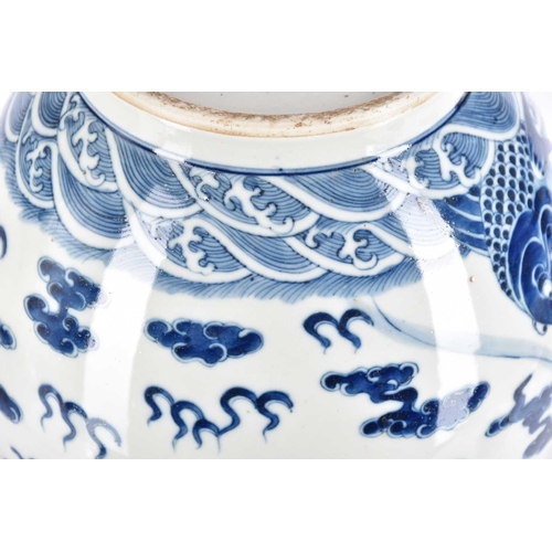 261 - A large Chinese blue & white tianqiuping dragon vase, the flared neck painted with spuming waves abo... 