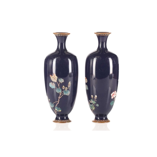 263 - A pair of Japanese Meiji period cloisonné vases, with floral decoration in polychrome enamels, on a ... 