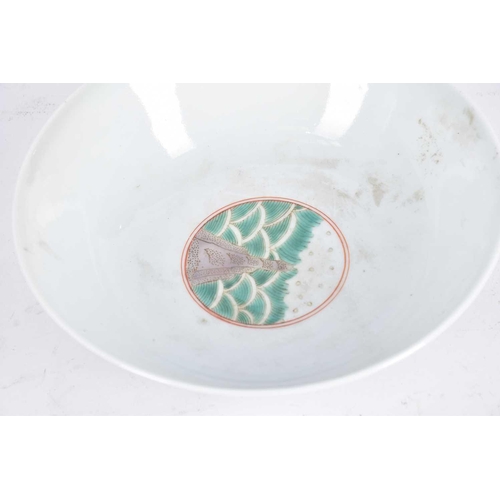 272 - A Chinese famille verte dragon bowl, the interior painted with waves and a rock, the exterior with t... 