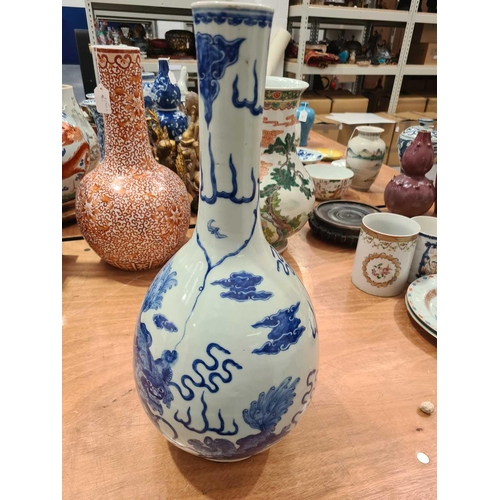 273 - A Chinese blue & white club shape vase, Qing, 19th century, the rim painted with a band of ruyi, the... 