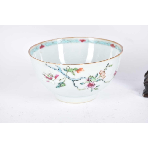 279 - A Chinese porcelain fluted saucer, Qing, painted with butterflies and floral sprigs, the underside w... 