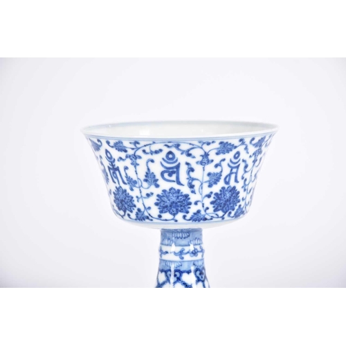 291 - A Chinese blue & white 'Lanca Character' stem cup, the steep flaring sides with lanca characters wit... 