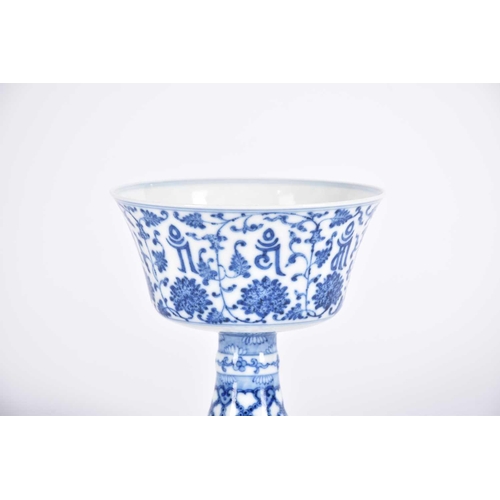 291 - A Chinese blue & white 'Lanca Character' stem cup, the steep flaring sides with lanca characters wit... 