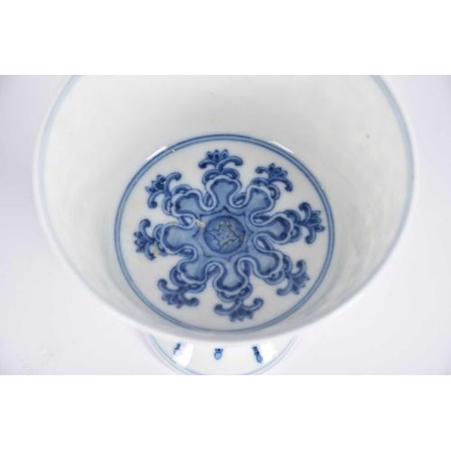 291 - A Chinese blue & white 'Lanca Character' stem cup, the steep flaring sides with lanca characters wit... 