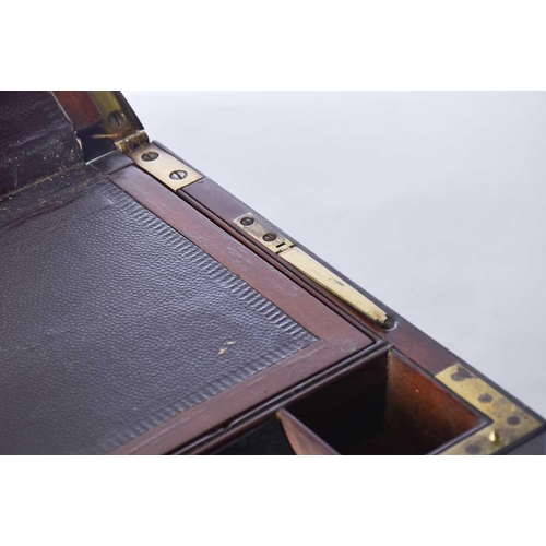 302 - A 19th-century brass-bound mahogany campaign style writing slope, with fitted a removable book rest ... 