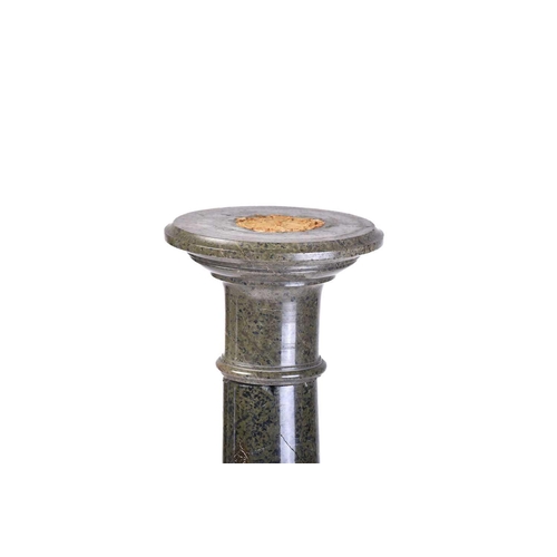 311 - A Victorian turned green variegated marble column with simple moulded capital and an octagonal base.... 