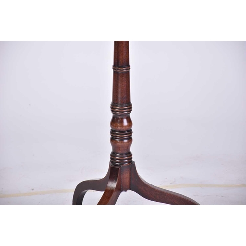 314 - A late 18th century Sheraton style mahogany urn table with canted rectangular top over a slender col... 