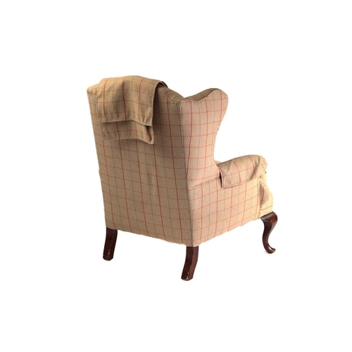 320 - A close pair of George III style wingback fireside armchairs, early 20th century with cream plaid up... 