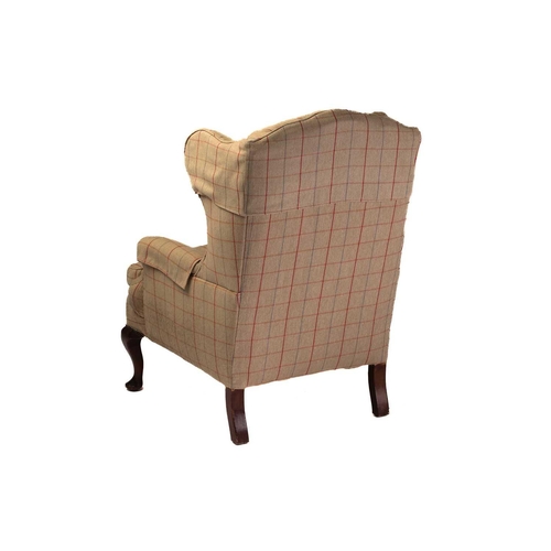 320 - A close pair of George III style wingback fireside armchairs, early 20th century with cream plaid up... 