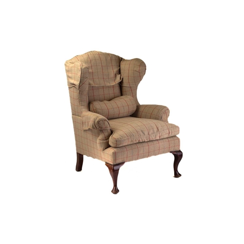 320 - A close pair of George III style wingback fireside armchairs, early 20th century with cream plaid up... 