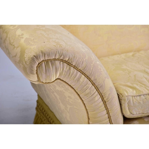 321 - A pair of Harrods camel back two-seat sofas with stuff over pale gold Damask upholstery with scroll ... 