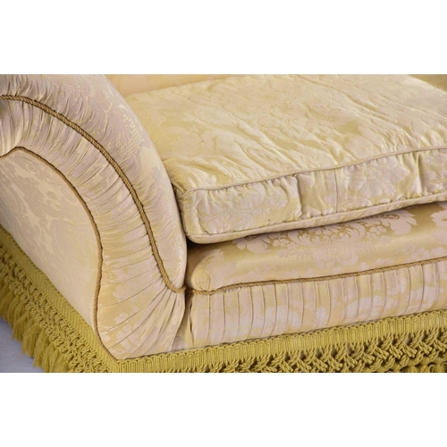 321 - A pair of Harrods camel back two-seat sofas with stuff over pale gold Damask upholstery with scroll ... 