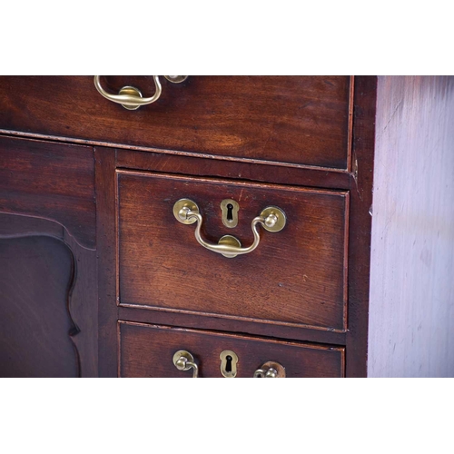 322 - A George III mahogany kneehole writing desk the frieze drawer with fitted interior and baize lined s... 