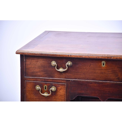 322 - A George III mahogany kneehole writing desk the frieze drawer with fitted interior and baize lined s... 