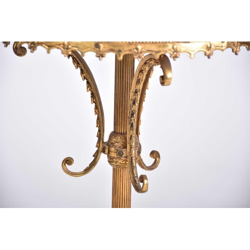 323 - A 'Hollywood Regency' heavy gilt brass and marble-topped circular pedestal low table, 20th century, ... 