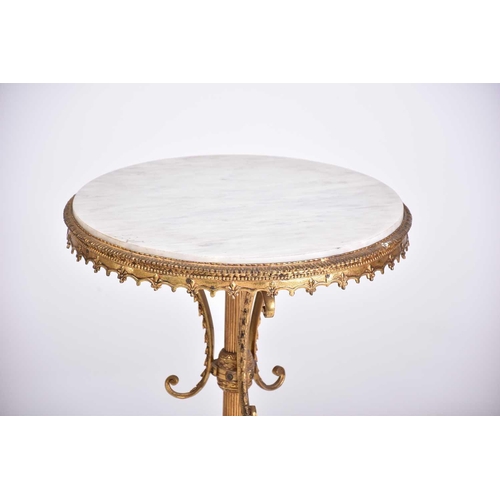 323 - A 'Hollywood Regency' heavy gilt brass and marble-topped circular pedestal low table, 20th century, ... 