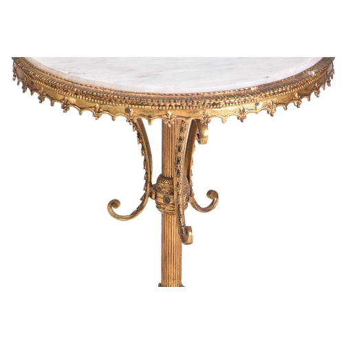 323 - A 'Hollywood Regency' heavy gilt brass and marble-topped circular pedestal low table, 20th century, ... 