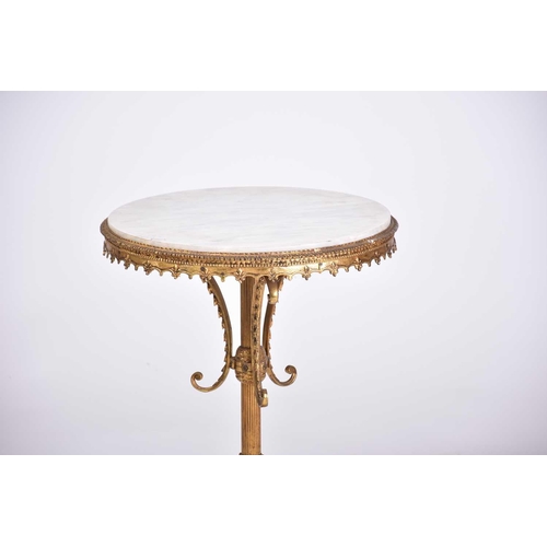 323 - A 'Hollywood Regency' heavy gilt brass and marble-topped circular pedestal low table, 20th century, ... 