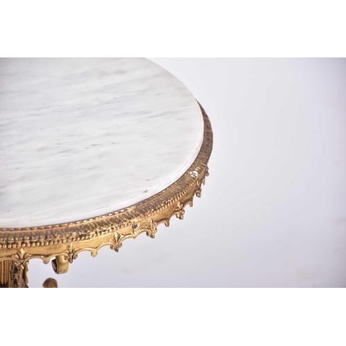 323 - A 'Hollywood Regency' heavy gilt brass and marble-topped circular pedestal low table, 20th century, ... 