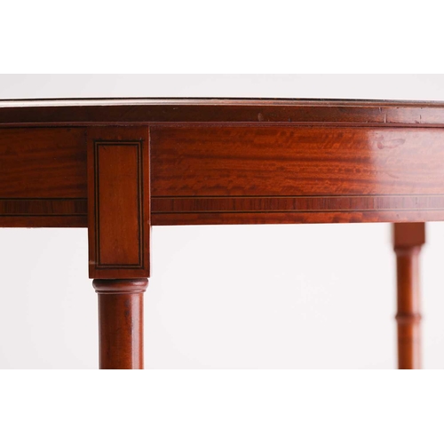 325 - A Sheraton style figured satinwood oval centre table, early 20th century, the crossbanded top inlaid... 