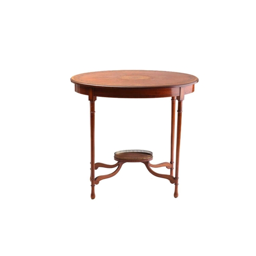 325 - A Sheraton style figured satinwood oval centre table, early 20th century, the crossbanded top inlaid... 