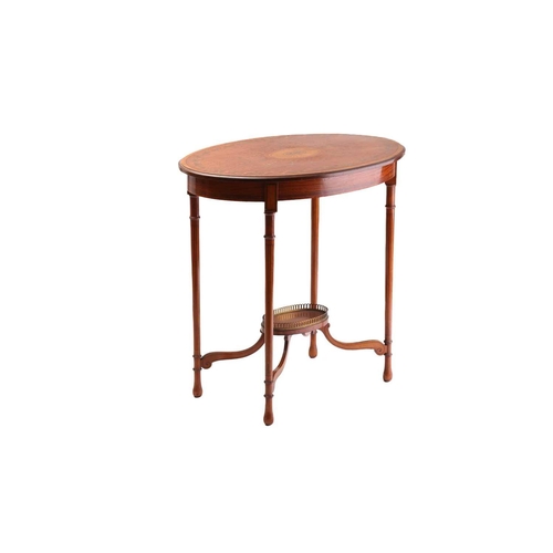 325 - A Sheraton style figured satinwood oval centre table, early 20th century, the crossbanded top inlaid... 