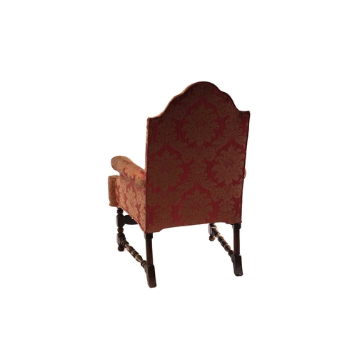 326 - A late 17thcentury style scroll arm fireside armchair, early 20th century, with 