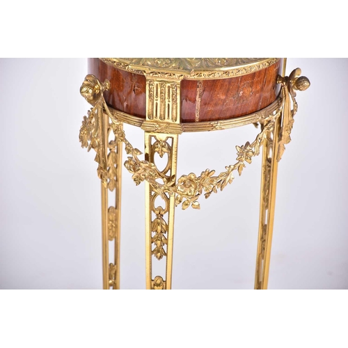 331 - A Louis XVI style marble-topped gilt bronze and mahogany circular gueridon, late 19th century, with ... 